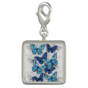 Composition of White and Blue Butterflies Charm