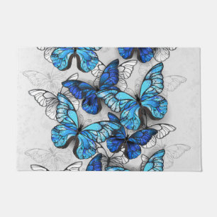 Composition of White and Blue Butterflies Doormat