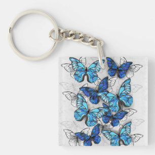 Composition of White and Blue Butterflies Keychain