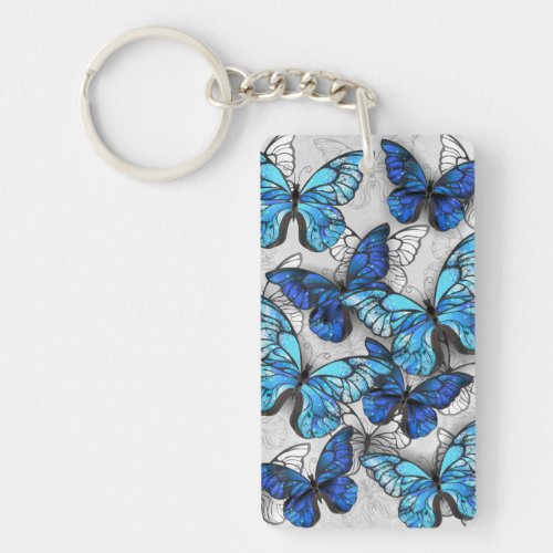 Composition of White and Blue Butterflies Keychain