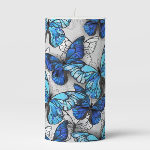 Composition of White and Blue Butterflies Pillar Candle