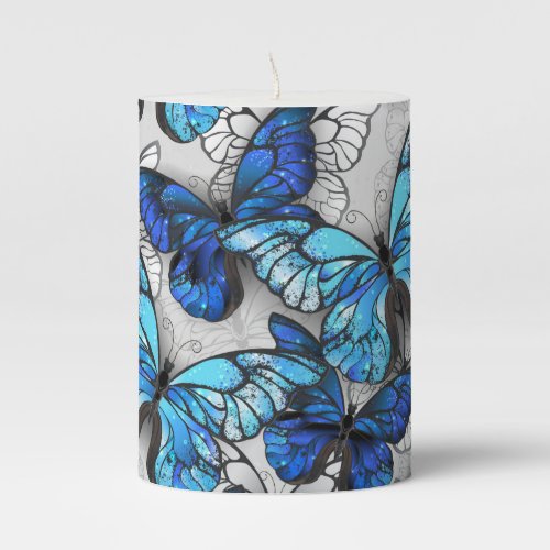 Composition of White and Blue Butterflies Pillar Candle