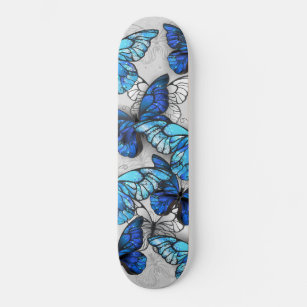 Composition of White and Blue Butterflies Skateboard