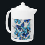 Composition of White and Blue Butterflies Teapot<br><div class="desc">Vertical composition of realistic,  blue and white morpho butterflies on gray textured background. Morpho blue butterfly.</div>