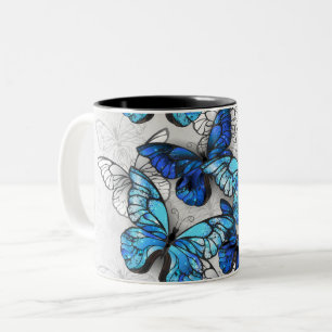 Composition of White and Blue Butterflies Two-Tone Coffee Mug