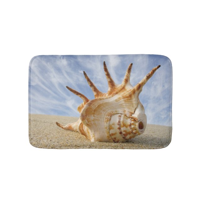 Conch Shell on Sandy Beach, Blue Sky Bathroom Mat (Front)