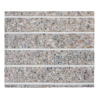 Concrete pebbles wall duvet cover