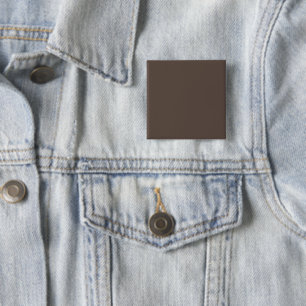 Confidently Against a Stylish Brown Wall Button