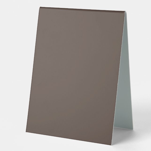 Confidently Against a Stylish Brown Wall Table Tent (Front)