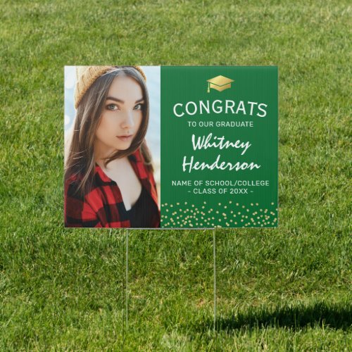 Congratulations 2022 Photo Graduate Yard Sign - Personalized graduate yard sign featuring a deep green background that can be changed to any color, a photo of the student, a graduation cap, gold glitter, and a congratulations template that is easy to personalize.