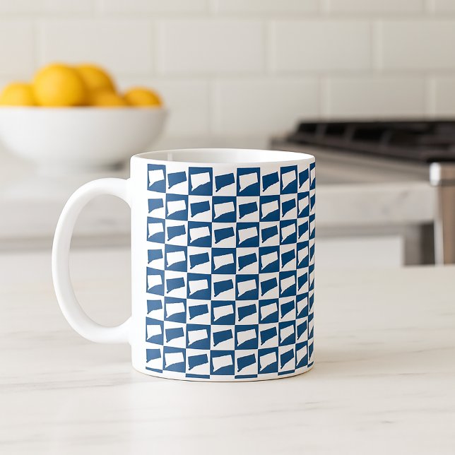 Connecticut State Silhouette Pattern in Blue White Coffee Mug (A mug with a blue and white pattern featuring the US state of Connecticut.)