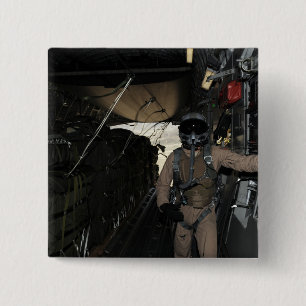 Container Delivery System bundles exit a C-17 Pinback Button