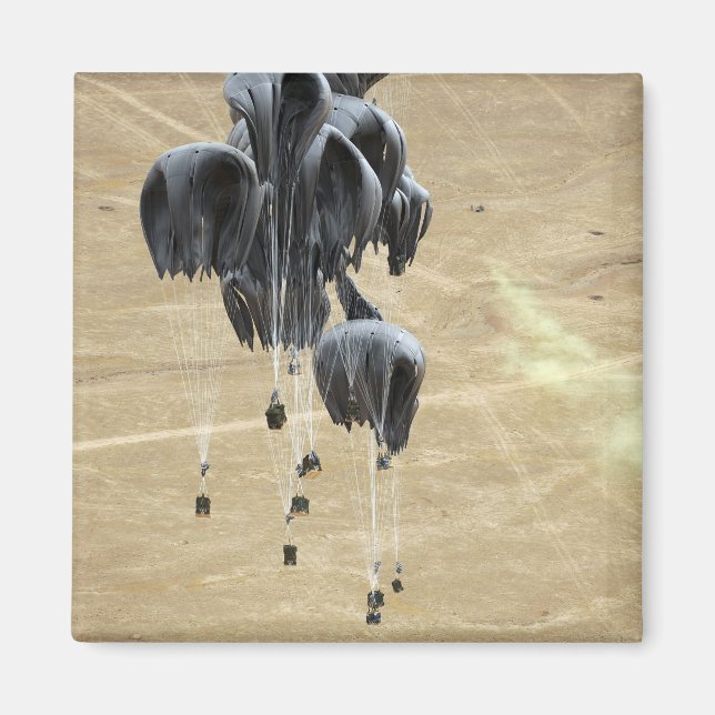 Container delivery system bundles parachute magnet (Front)