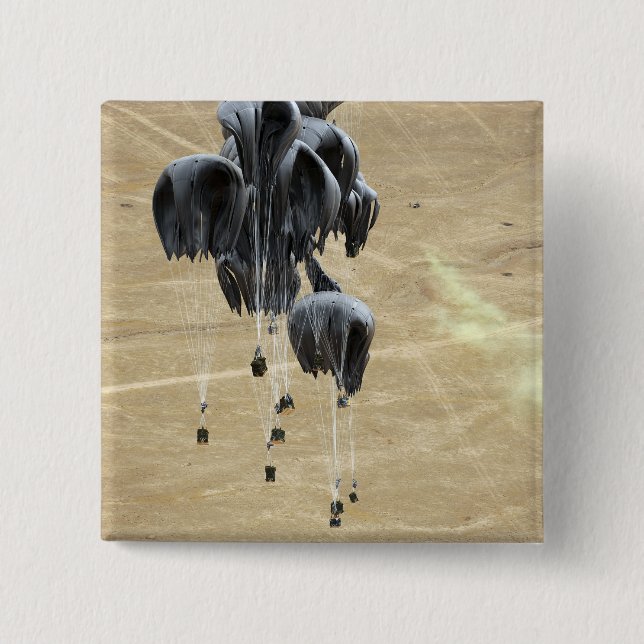 Container delivery system bundles parachute pinback button (Front)