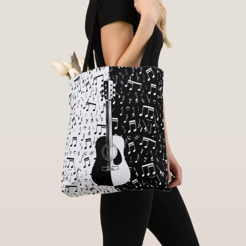 Contemporary black and white guitar and music note tote bag