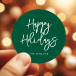 Contemporary Happy Holidays Green Classic Round Sticker<br><div class="desc">Happy Holidays Green stickers. A modern and bold typography for this personalizable holiday items collection. Fully customizable colors.</div>