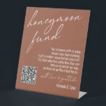 Contemporary Honeymoon Fund QR Code Terracotta Pedestal Sign<br><div class="desc">This collection features an elegant, modern, handwritten font to create key words and phrases. In this piece, the graphic typography overlays read "honeymoon fund" in the large header area and "with love & gratitude" before your names. Use the template fields to update your personal gratitude note and names. Feel free...</div>