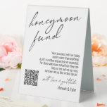 Contemporary Honeymoon Fund QR Code White Table Tent Sign<br><div class="desc">This collection features an elegant, modern, handwritten font to create key words and phrases. In this piece, the graphic typography overlays read "honeymoon fund" in the large header area and "with love & gratitude" before your names. Use the template fields to update your personal gratitude note and names. Feel free...</div>