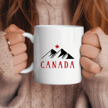 Cool Canada Mountains Canadian Maple Leaf  Coffee Mug<br><div class="desc">Shows two mountain peaks,  Canada below them,  and a Canadian maple leaf above the mountains. Cool,  slick black and red design,  both retro and modern at the same time.
For people who love Canada,  mountains,  winter,  snow,  skiing,  snowboarding,  and Canada's Rocky Mountains. Awesome souvenir or way to be patriotic.</div>