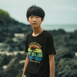 Cool Custom Tropical Beach Trip Palm Trees Kids T-Shirt<br><div class="desc">These cool personalized tropical beach sunset kids t-shirts feature 3 palm trees silhouetted against an orange and blue sky accented with yellow and green at the coast. Customize for great family trip keepsake children's tees for your coastal getaway this spring break or summer or ocean cruise vacation.</div>