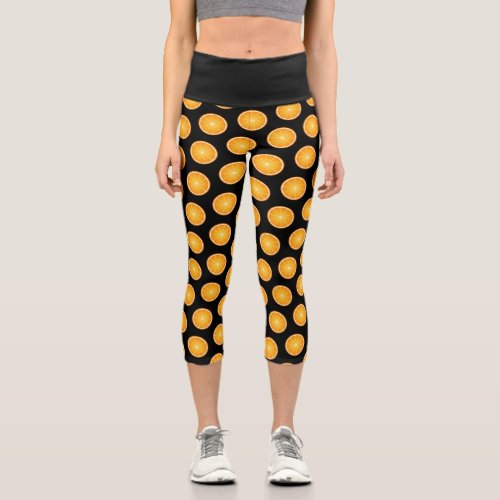 Cool Juicy Orange fruit slices pattern on black Capri Leggings