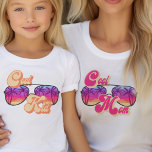 Cool Kid Bright Sunset Sunglasses Matching T-Shirt<br><div class="desc">Cool Kid t-shirt with matching cool mom version available. The design reads Cool Kid in curvy modern retro typography and features cool sunglasses with tropical hawaiian palms and colorful sunset. The design is in shades of orange banana pink red purple and blue in bright amp'd up colors. Perfect for mothers...</div>
