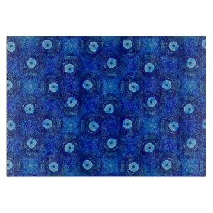 Cool, modern digital art of blue evil eye pattern cutting board