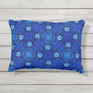 Cool, modern digital art of blue evil eye pattern outdoor pillow