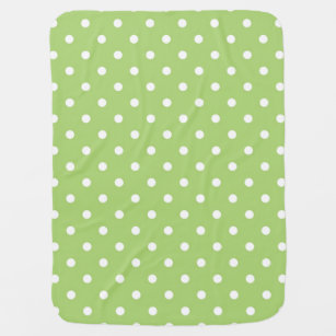 green baby blanket with white polka dots