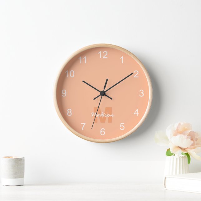 Cool pastel peach color with Custom Monogram name Clock (Home)