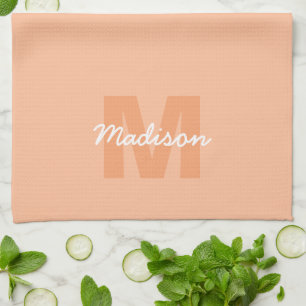 Cool pastel peach color with Custom Monogram name Kitchen Towel