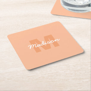 Cool pastel peach color with Custom Monogram name Square Paper Coaster