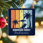 Cool Retro Beach Vacation Custom Blue Christmas Ceramic Ornament<br><div class="desc">Personalized navy blue beach Christmas ornament keepsake for your family trip to Hawaii, Florida, or other tropical island destinations. Cool palm trees sway against retro colors of orange and yellow above your customized vacation name in white script. Matching gifts are great for a group going on a cruise or coastal...</div>
