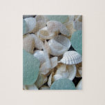 Cooling Glass Jigsaw Puzzle<br><div class="desc">Beautiful light green sea glass surrounded by white sea shells</div>