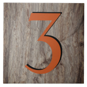 Copper Glow House Number Tile 3 on Gray Stone