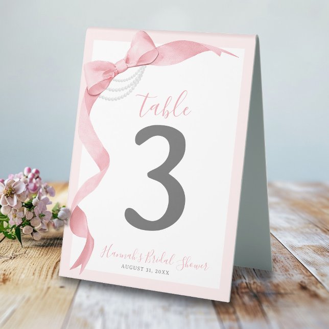 Coquette Pink Bow & Pearls Bridal Shower Welcome Table Tent (Cute coquette pink and white watercolor bows and pearls girly wedding bridal shower table number)