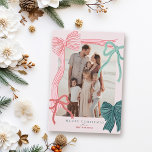 Coquette Red & Green Bows Pink Photo Christmas Holiday Card<br><div class="desc">Celebrate the season in style with this charming, coquette-inspired Christmas photo card, featuring hand-drawn bows, soft colors, and a romantic, ribbon-filled design. The front features your favorite picture framed by four hand-drawn bows—one bold pink ribbon with red stripes, one green ribbon with navy stripes, plus two smaller accents in classic...</div>