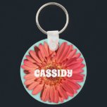 Coral Colored Gerbera Daisy Photo Mint Green Keychain<br><div class="desc">Add a burst of color to your day with this round keychain. It features a photo of a gerbera daisy in a bright coral color set against a mint green background. It's ready to be personalized with a name in bold white lettering. Makes a cute small gift or party favor....</div>