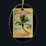 Coral Gables Palm Tree Vintage Travel Ceramic Ornament<br><div class="desc">A uniquely retro mid-century modern Coral Gables Florida art print in vintage travel poster style. It features a curved palm tree on sandy beach with ocean under a blue cloudy sky.</div>