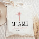 Coral Palm Tree Personalized Bachelorette Party Tote Bag<br><div class="desc">Welcome friends to your bachelorette weekend with these cute personalized tote bags. Perfect for beachy or tropical locales, this design features a coral pink palm tree silhouette illustration with your destination beneath (shown with Miami) in classic serif lettering. Add your name(s) or occasion name beneath in handwritten cursive script, as...</div>