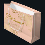 Coral Peach & Gold Lace Elegant Bridesmaid Large Gift Bag<br><div class="desc">This beautiful gift bag is designed as a wedding gift or favor bag for Bridesmaids. It features an elegant coral peach or pale orange and gold design with golden lace frills in the corners the text "Bridesmaid" as well as a place to enter her name, the couple's name, and the...</div>