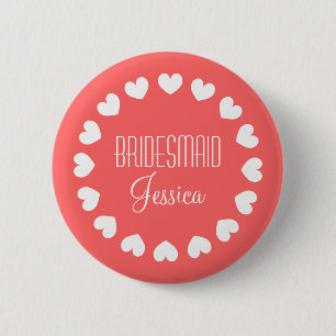 Coral pink bridesmaid button with white hearts