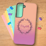 Coral Purple Ombre Wreath Encircled Monogram Name  Samsung Galaxy S22 Case<br><div class="desc">This chic phone case features a shade of purple and coral ombre background with initial letter monogram enclosed in a matching color wreath. Personalize the case in the text fields with a name and initial, remove both or one item or edit using the design tool to select a font style,...</div>