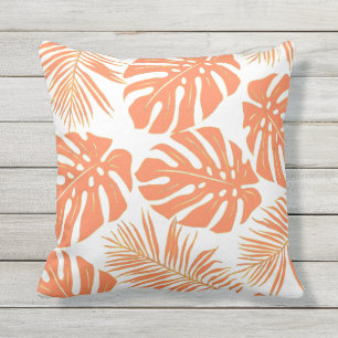 Coral tropical monstera and palm leaves pattern outdoor pillow