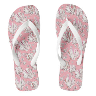 Coral, white and pink sea shells, pink background flip flops