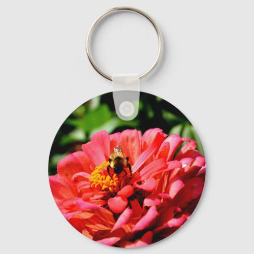 Coral zinnia with bumblebee keychain