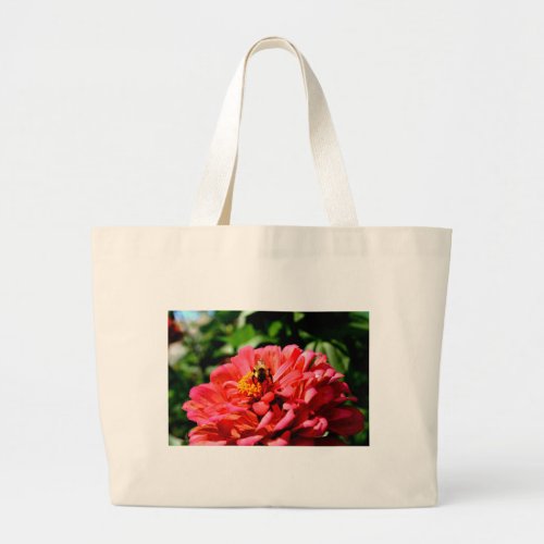 Coral zinnia with bumblebee large tote bag
