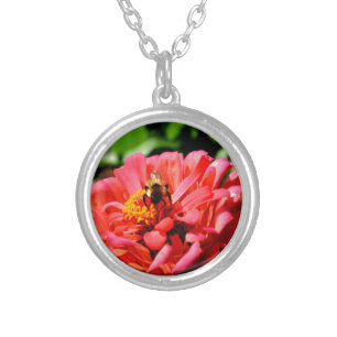 Coral zinnia with bumblebee silver plated necklace