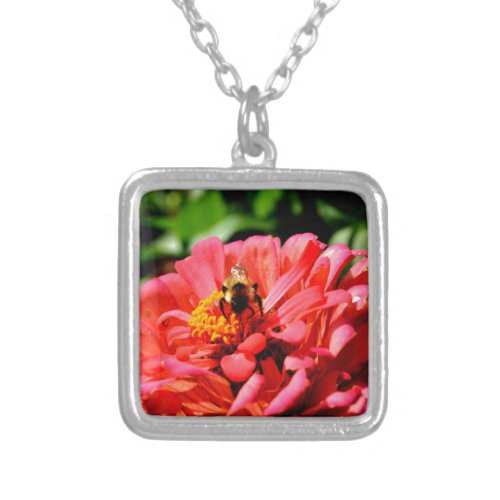 Coral zinnia with bumblebee silver plated necklace
