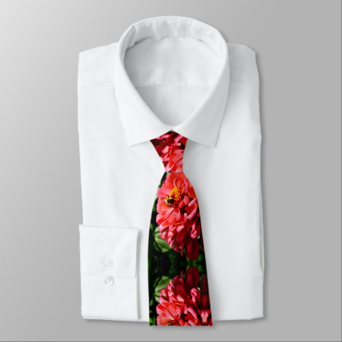 Coral zinnia with bumblebee tie